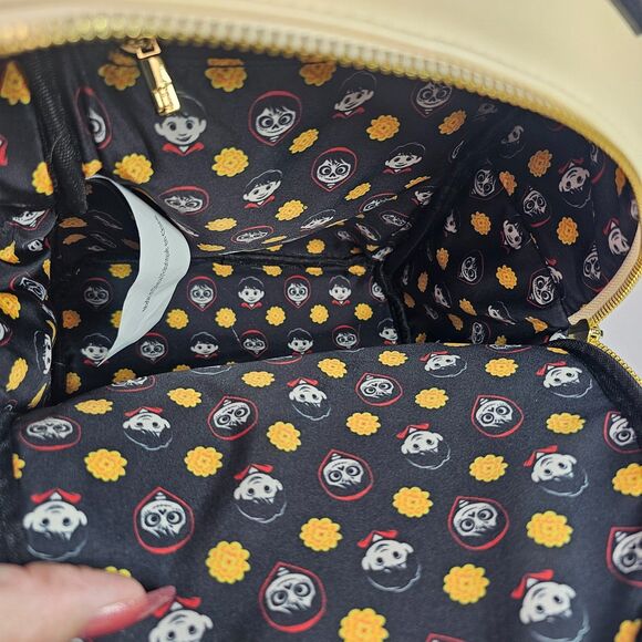 Loungefly Pixar Coco Marigold Floral Mini Backpack Cream Black Disney Bag main image 11